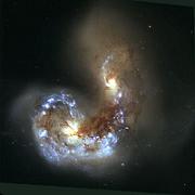 ستاره شناسان با استفاده از تلسکوپ کک قدیمی ترین برخورد بین کهکشان ها را کشف کردند .