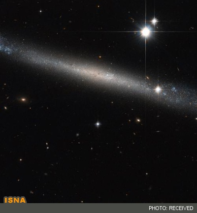 تلسکوپ فضایی هابل تصویر بسیار زیبایی را از کهکشان مارپیچ IC 2233 ارائه داد.
